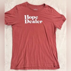 Beacon Threads Hope Dealer Men’s Size Large Red T-Shirt. In Light Brown Color.